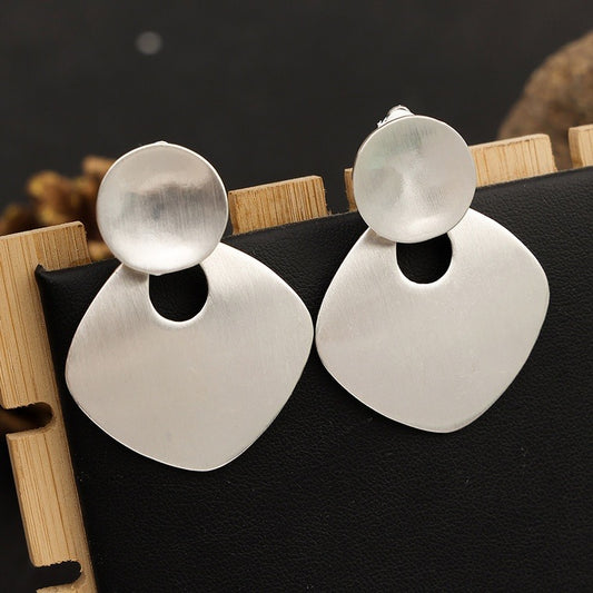 Silver Circle Clip On Earrings